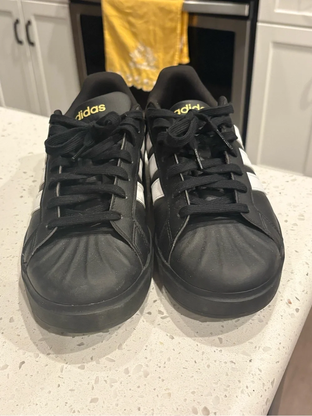 adidas Men’s Black Superstar Sneakers with White Stripes